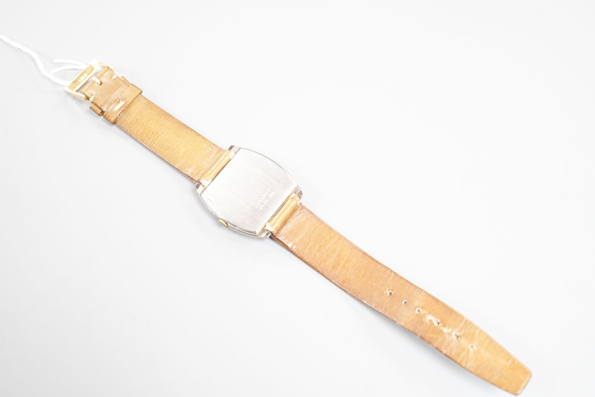 A gentleman's stainless steel Jaeger LeCoultre Club manual wind wrist watch, on associated strap, case diameter 32mm.
